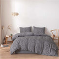 Alex quilted microfibre duvet cover set on a made bed