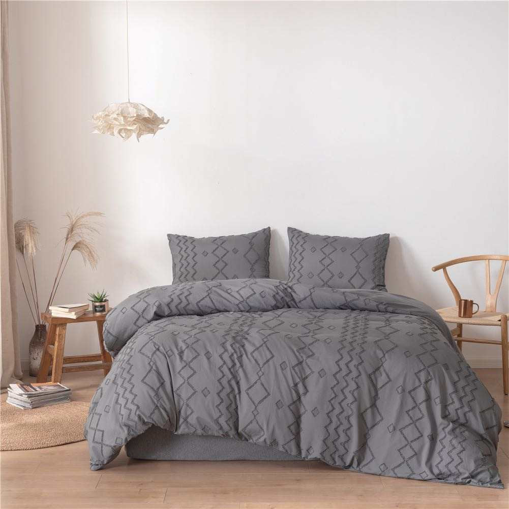 Alex quilted microfibre duvet cover set on a made bed