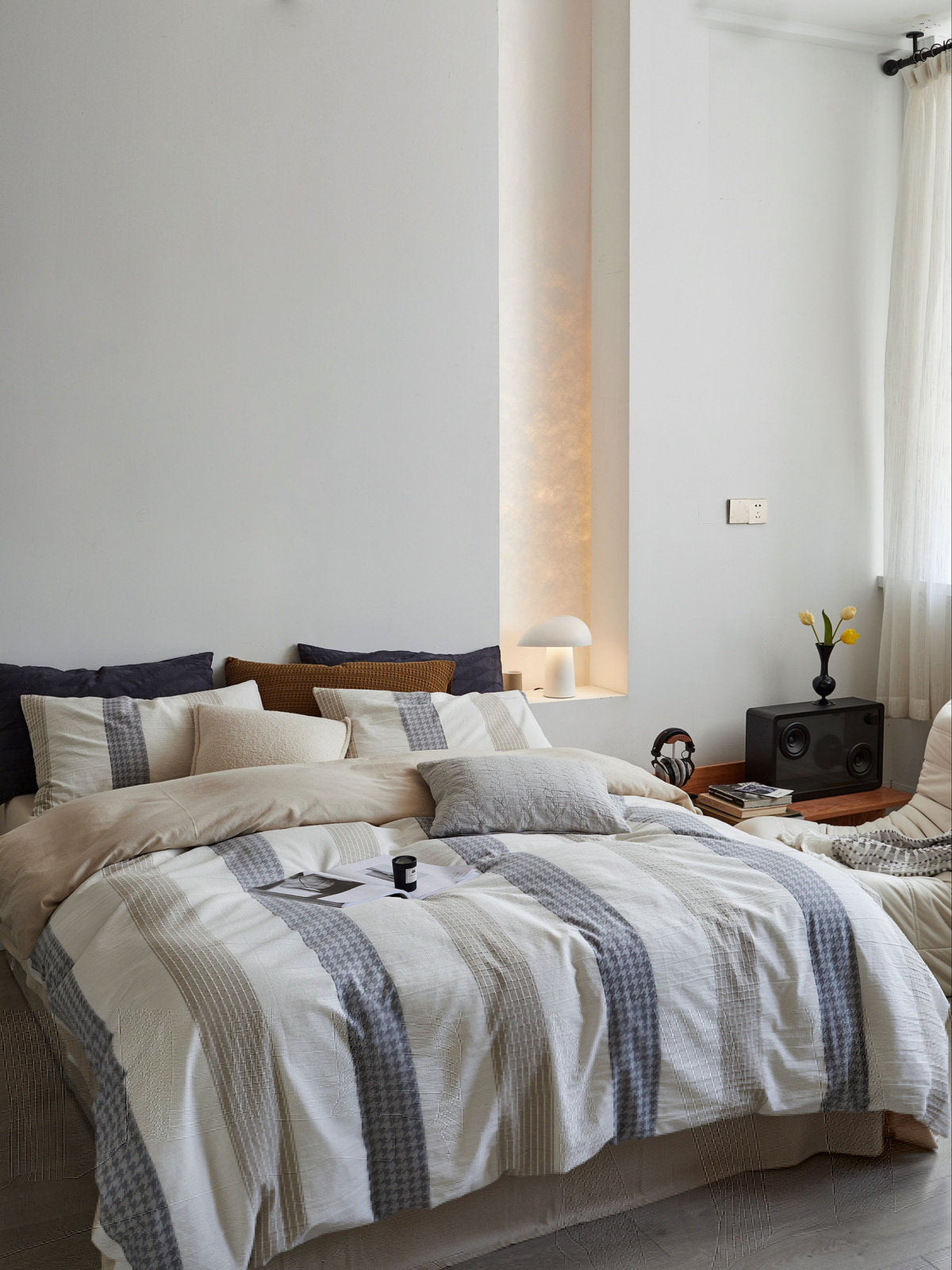 Tyler textured cotton duvet cover set on a made bed
